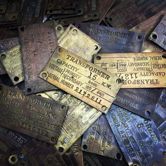 Vintage brass ID plate industrial tag